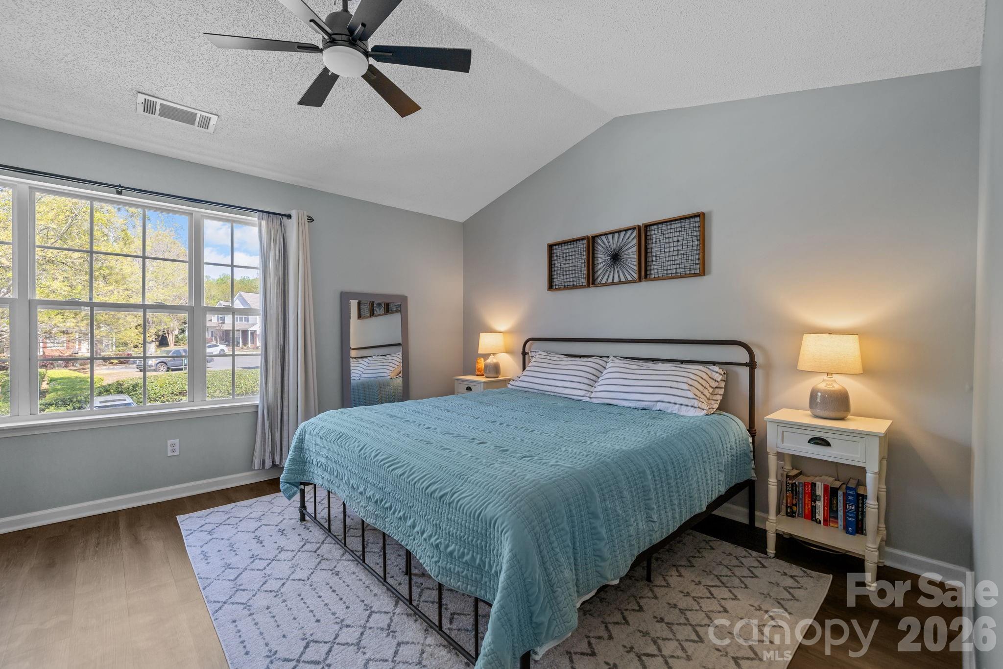 213 Butler Place Fort Mill, SC 29715 - Photo 15 of 36 a bedroom with a bed and a window