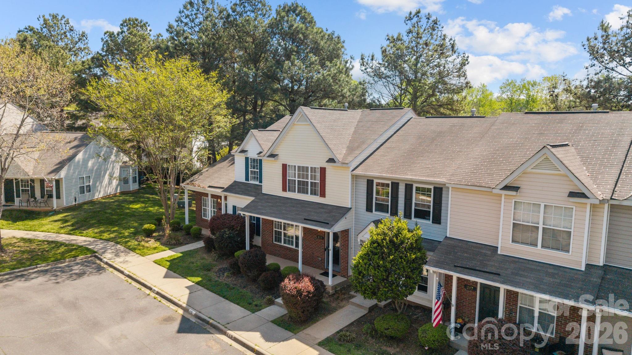 213 Butler Place Fort Mill, SC 29715 - Photo 26 of 36 front view of a house with a yard