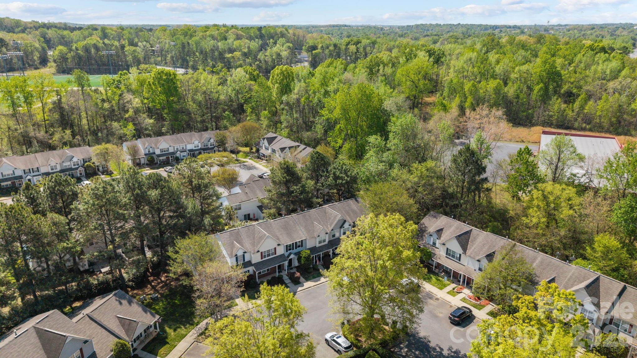 213 Butler Place Fort Mill, SC 29715 - Photo 28 of 36 an aerial view of residential house with outdoor space