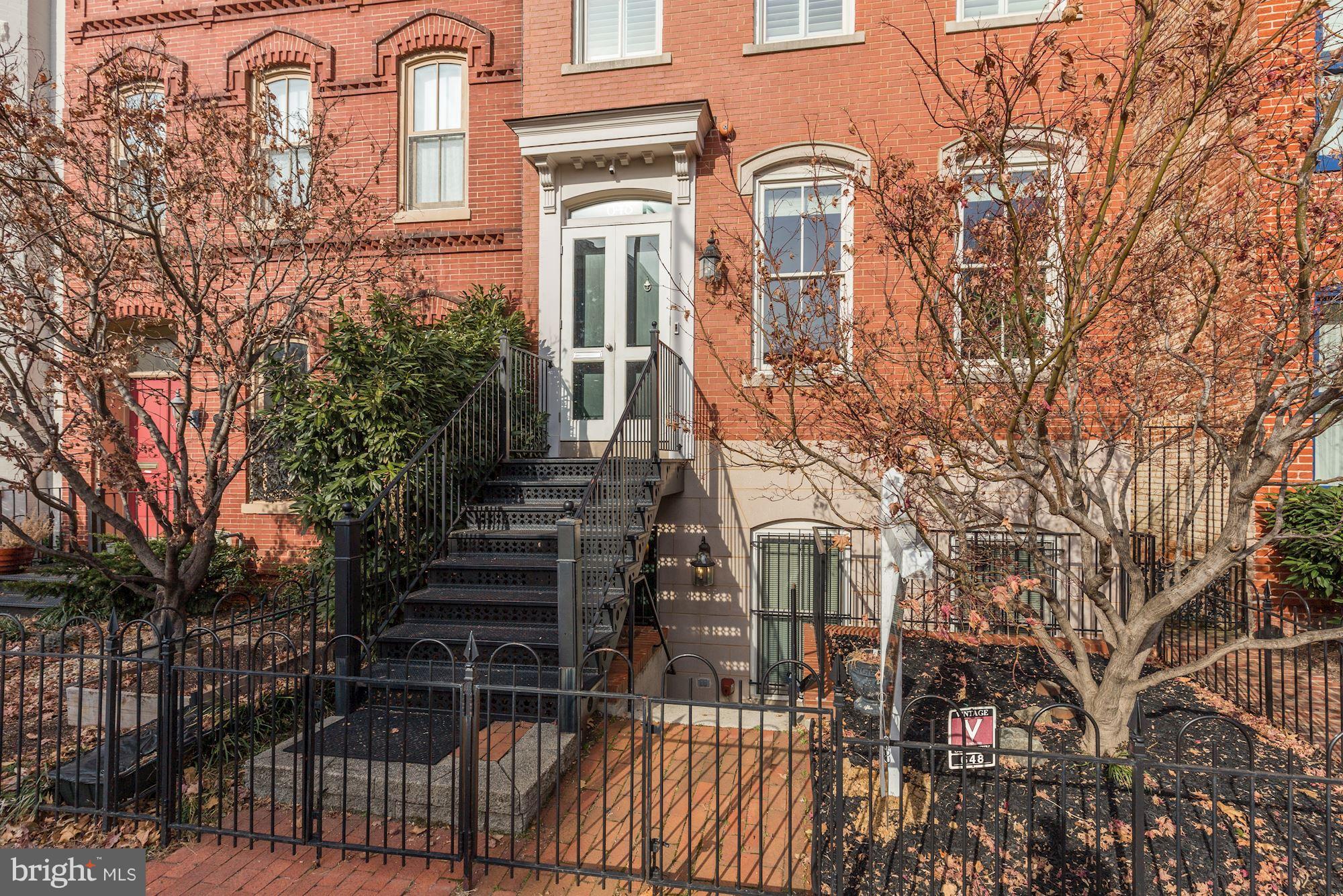 648 C Street Northeast Washington, DC 20002 - Photo 2 of 22 a front view of a multi story building