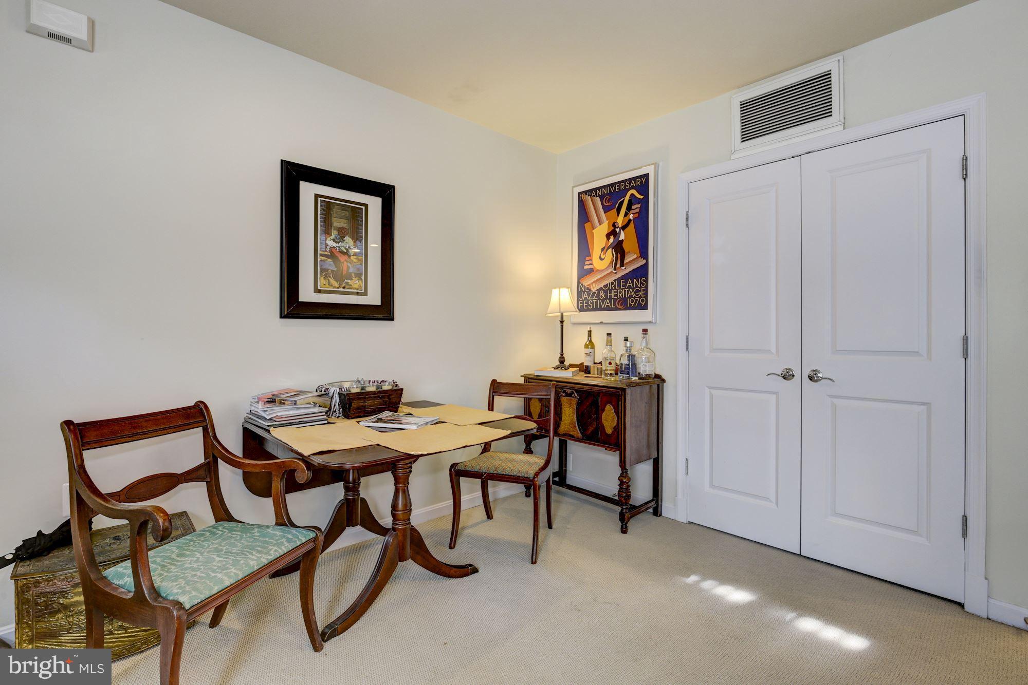 648 C Street Northeast Washington, DC 20002 - Photo 18 of 22 a view of a livingroom with furniture and window