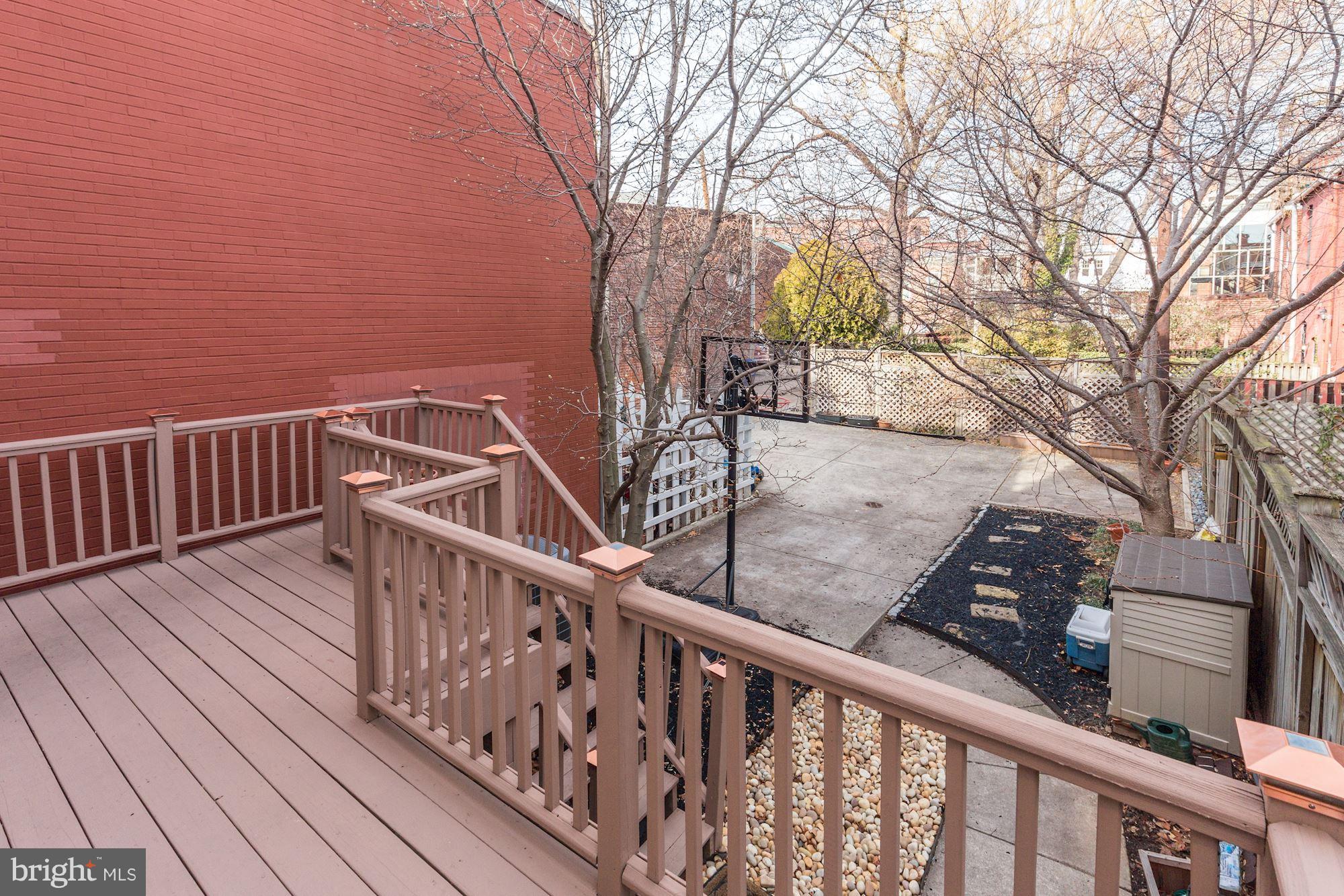 648 C Street Northeast Washington, DC 20002 - Photo 22 of 22 a view of balcony with wooden floor and fence