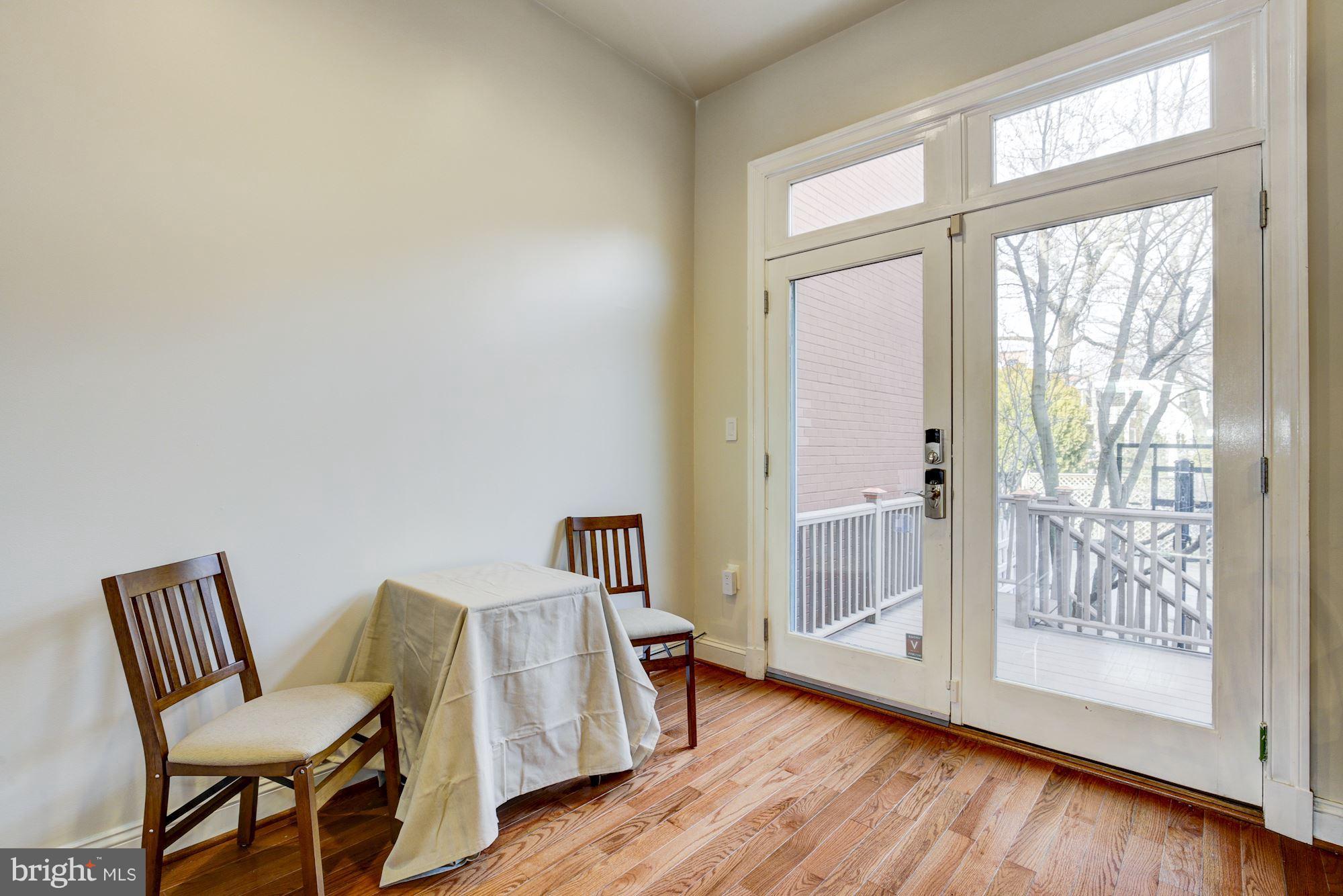 648 C Street Northeast Washington, DC 20002 - Photo 8 of 22 a view of a room with furniture and wooden floor