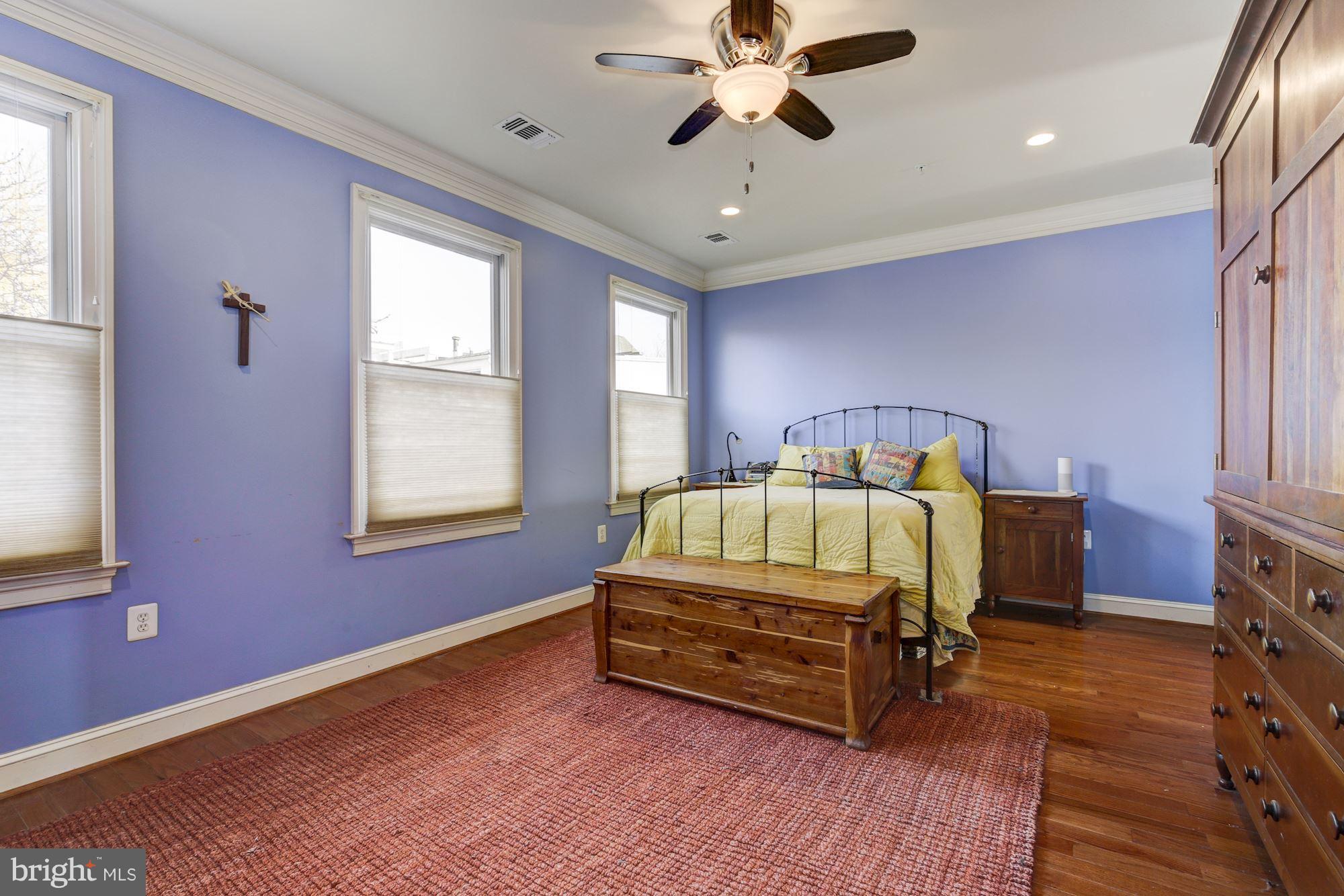 648 C Street Northeast Washington, DC 20002 - Photo 10 of 22 a bedroom with a bed and a window