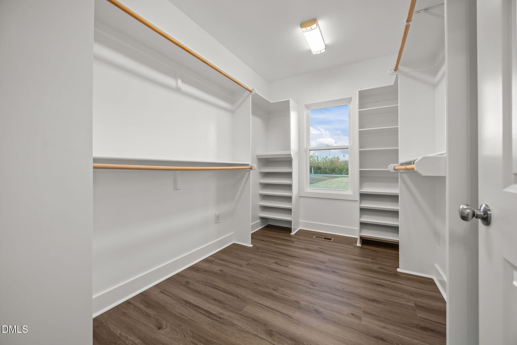 8629 Dukes Lake Road Zebulon, NC 27597 - Photo 26 of 52 a view of an empty walk in closet