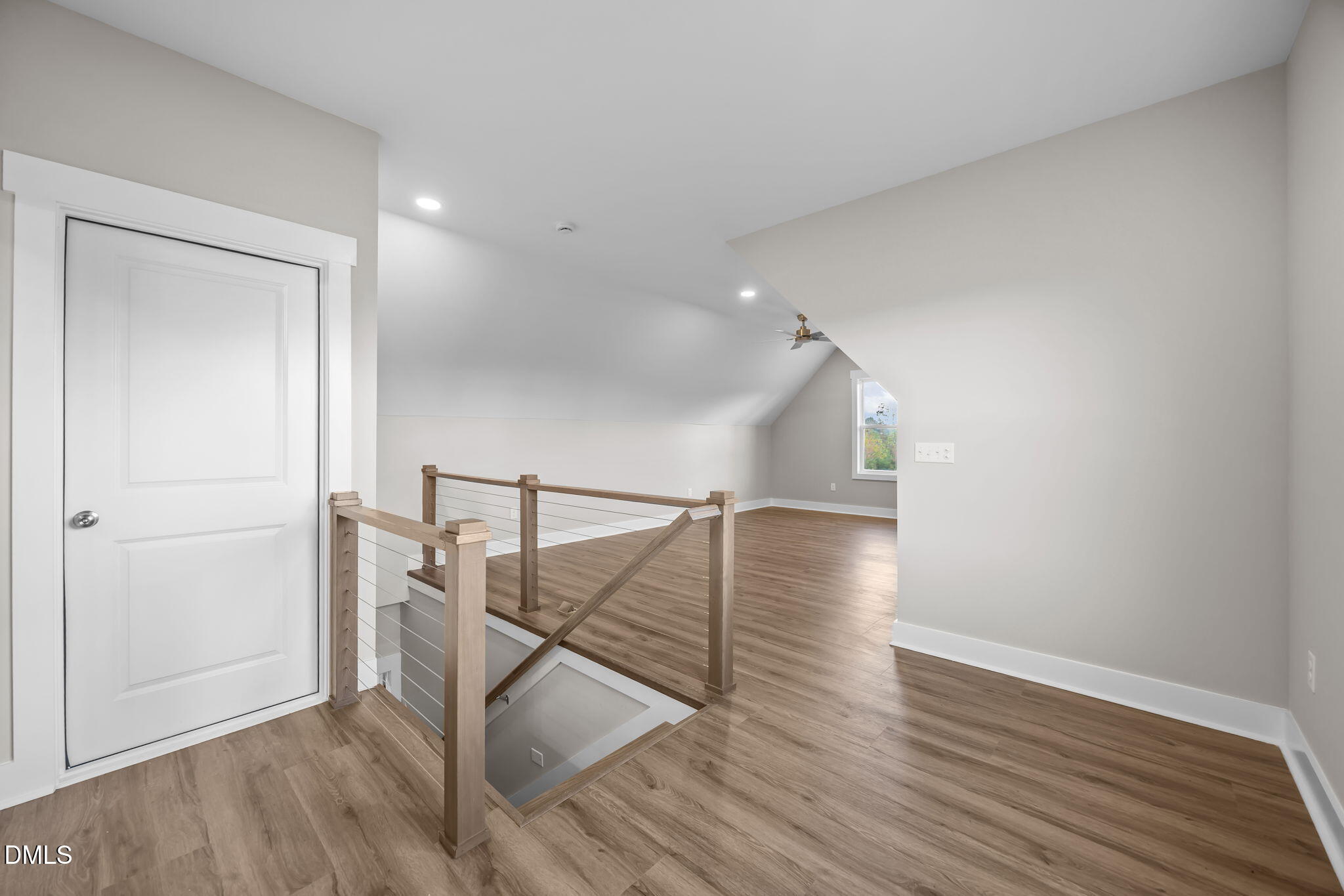 8629 Dukes Lake Road Zebulon, NC 27597 - Photo 32 of 52 a view of entryway and hall with wooden floor