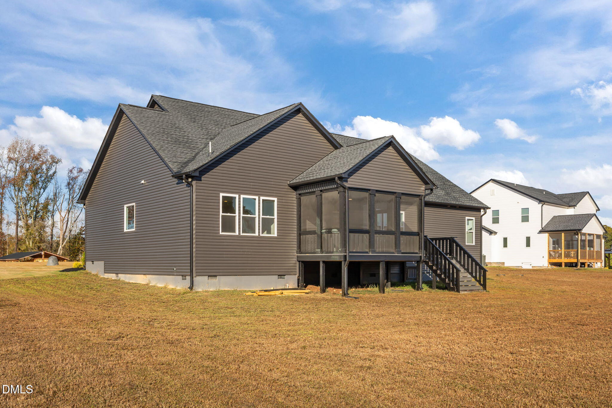 8629 Dukes Lake Road Zebulon, NC 27597 - Photo 41 of 52 a front view of a house with a yard