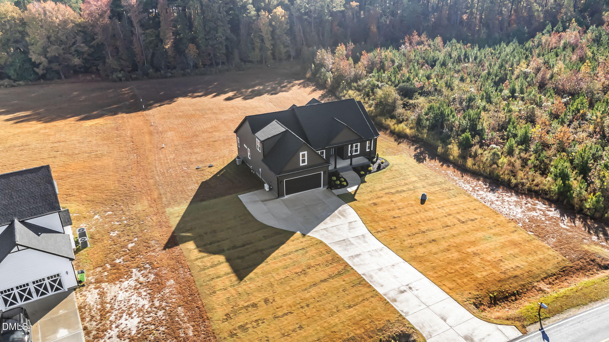 8629 Dukes Lake Road Zebulon, NC 27597 - Photo 47 of 52 a view of a backyard of the house