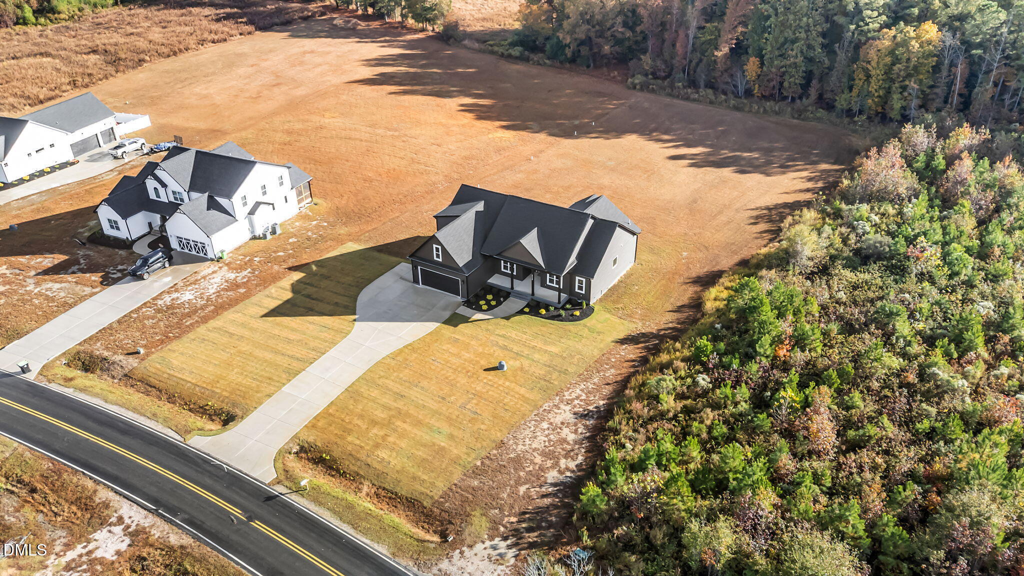 8629 Dukes Lake Road Zebulon, NC 27597 - Photo 48 of 52 a view of a backyard with plants
