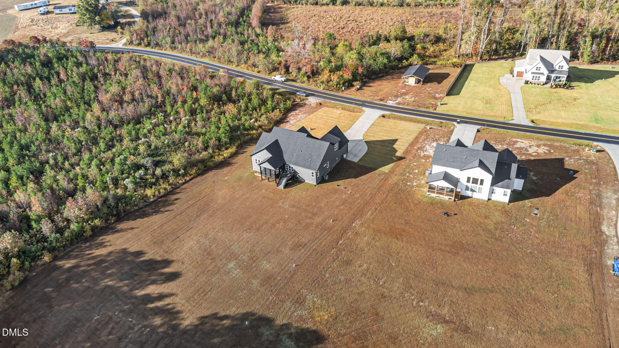8629 Dukes Lake Road Zebulon, NC 27597 - Photo 50 of 52 a view of a balcony with chairs