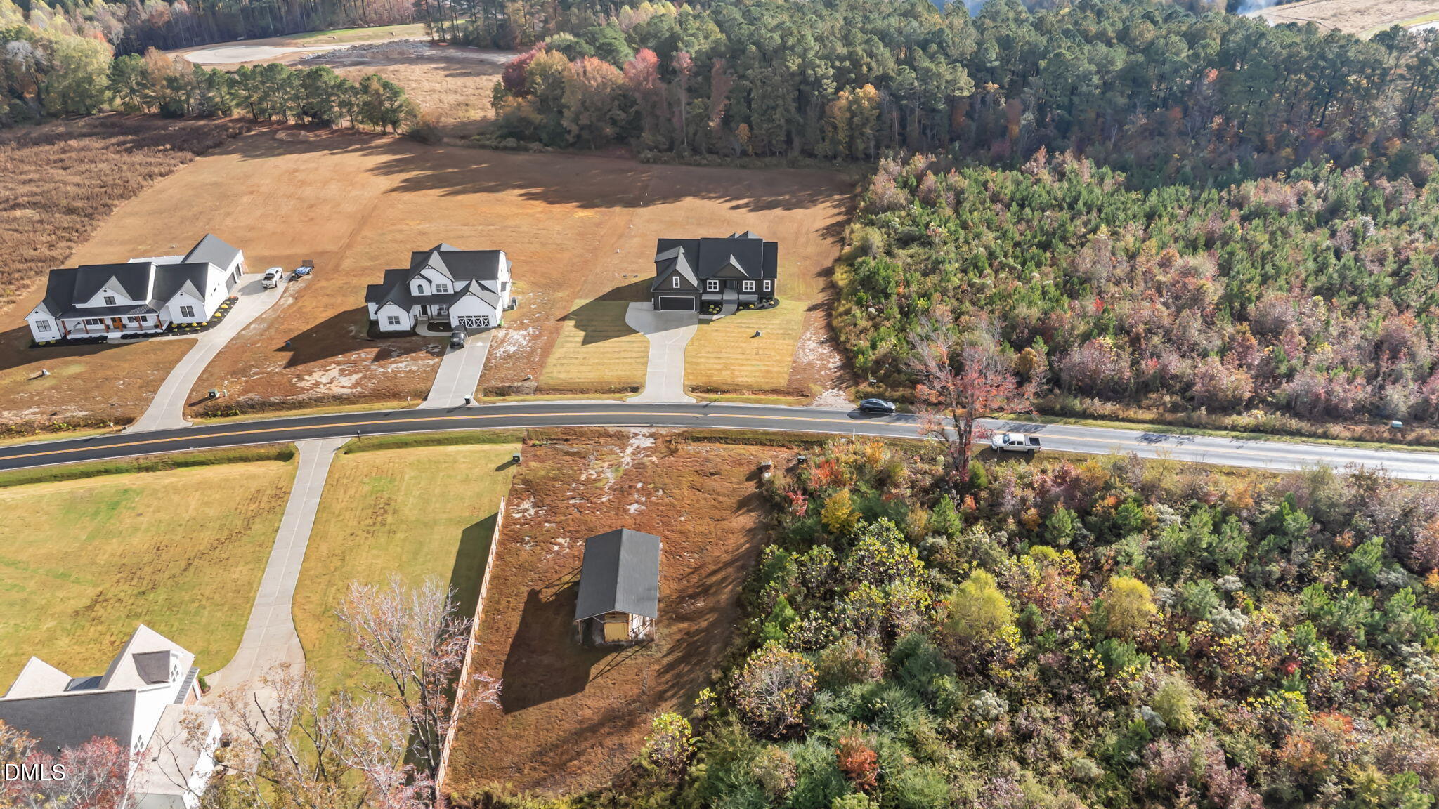 8629 Dukes Lake Road Zebulon, NC 27597 - Photo 52 of 52 a view of swimming pool from a lake