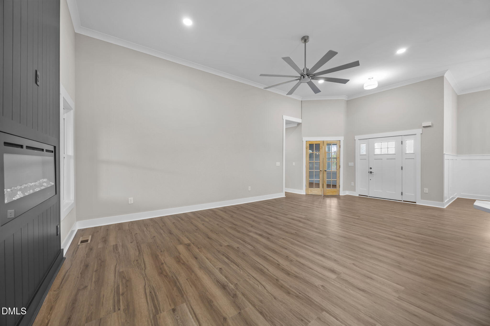 8629 Dukes Lake Road Zebulon, NC 27597 - Photo 9 of 52 wooden floor in an empty room with a window