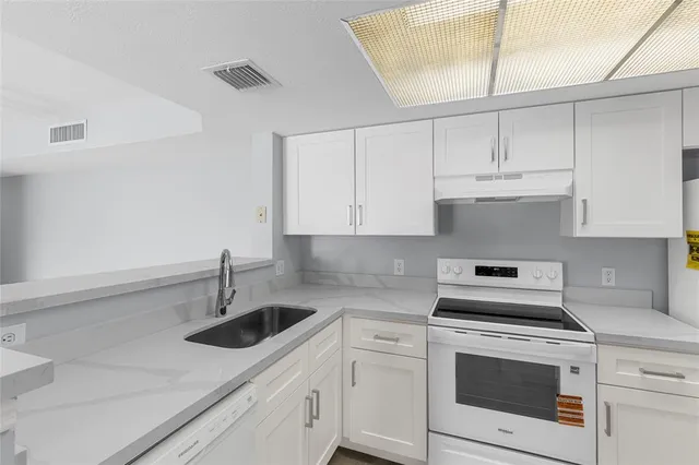 $285,000 | 5021 Wiles Road, Unit 202, Coconut Creek, FL 33073