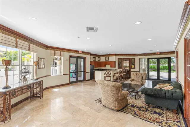 $285,000 | 5021 Wiles Road, Unit 202, Coconut Creek, FL 33073