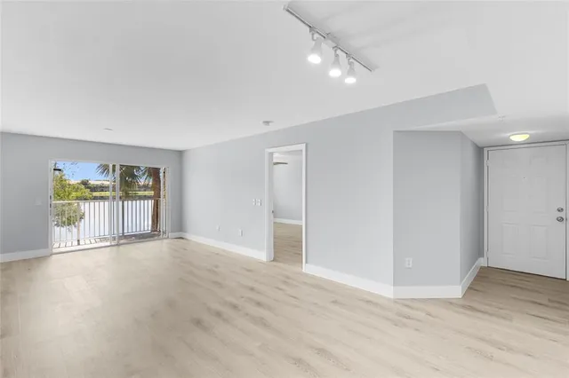 $285,000 | 5021 Wiles Road, Unit 202, Coconut Creek, FL 33073