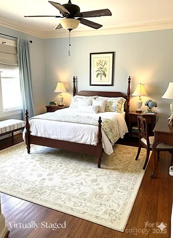 a bedroom with bed and window