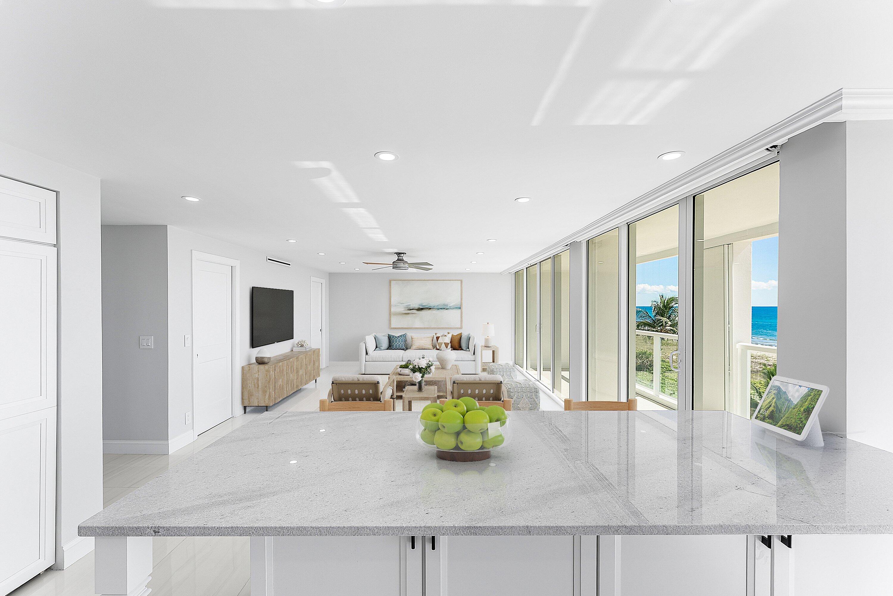 2800 South Ocean Boulevard, Unit 4E Boca Raton, FL 33432 - Photo 14 of 51 a living room with furniture large window and flat screen tv