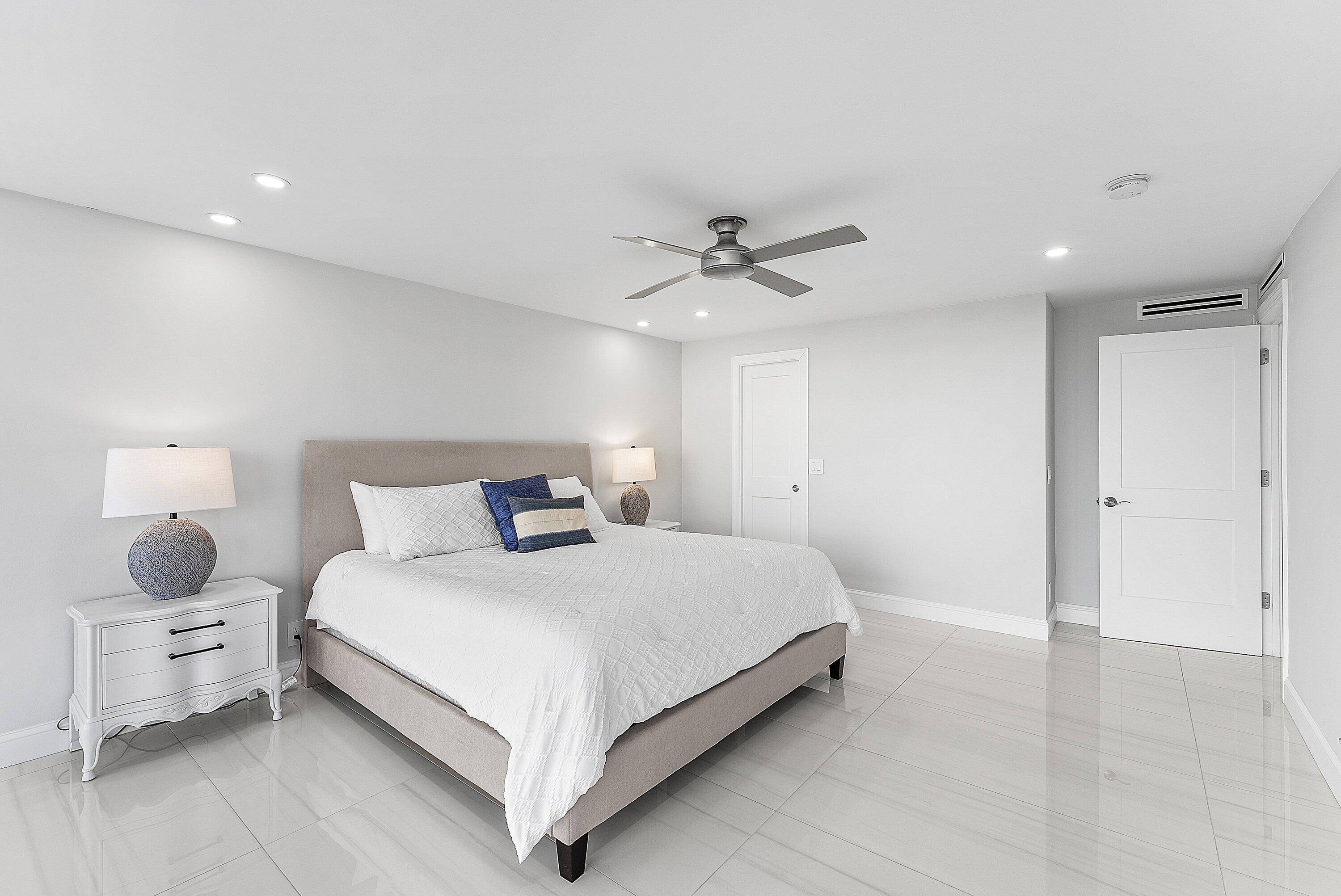 2800 South Ocean Boulevard, Unit 4E Boca Raton, FL 33432 - Photo 23 of 51 a bedroom with a bed and window