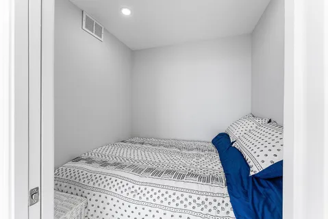 a view of a door and chair in a room