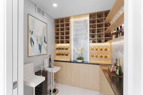 a view of kitchen with furniture and wooden floor