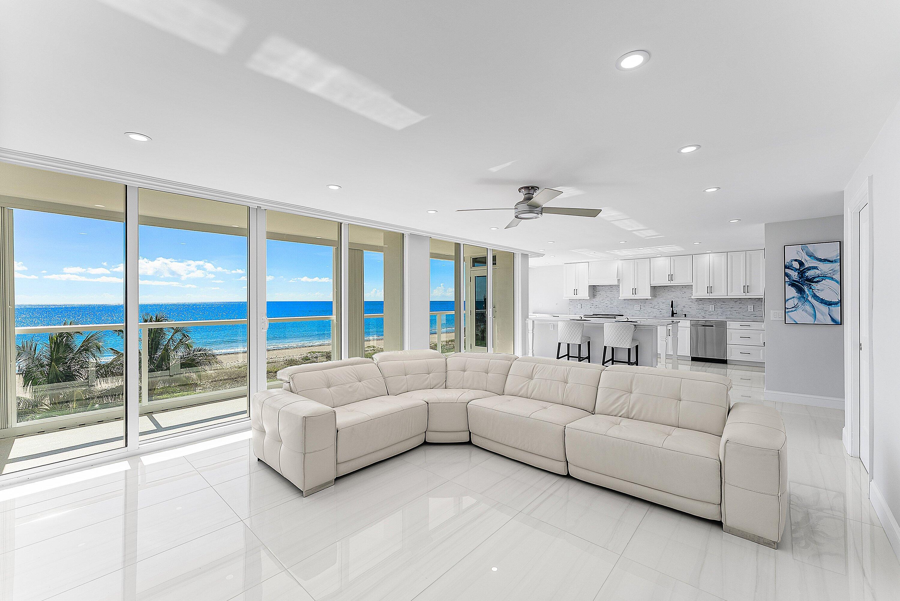 2800 South Ocean Boulevard, Unit 4E Boca Raton, FL 33432 - Photo 36 of 51 a living room with furniture and a large window