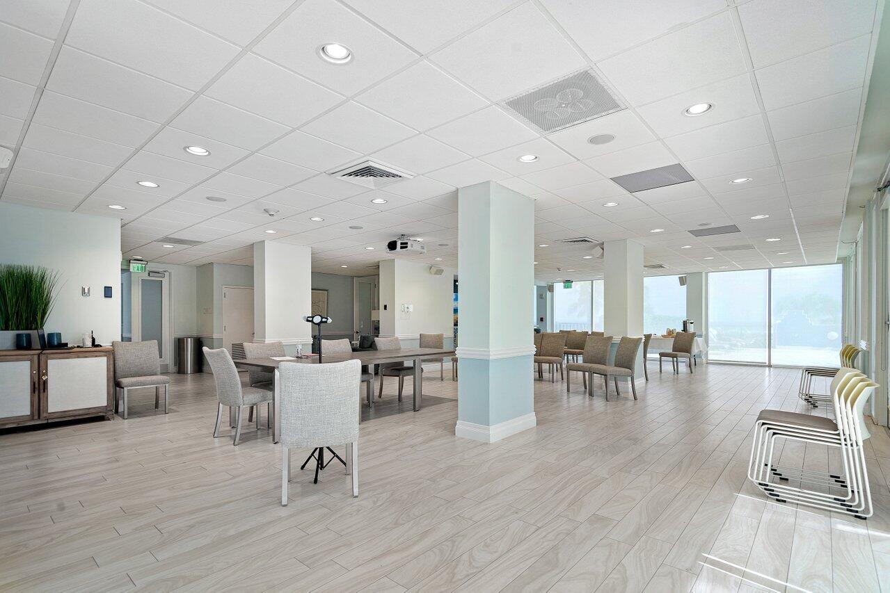 2800 South Ocean Boulevard, Unit 4E Boca Raton, FL 33432 - Photo 46 of 51 a view of a dining room with furniture and wooden floor