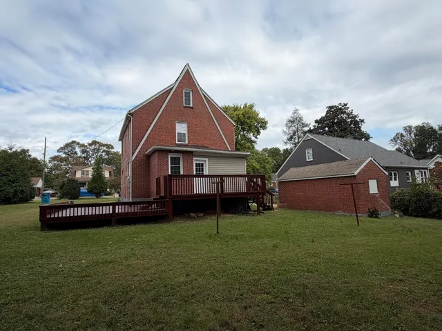 front view of house with a yard