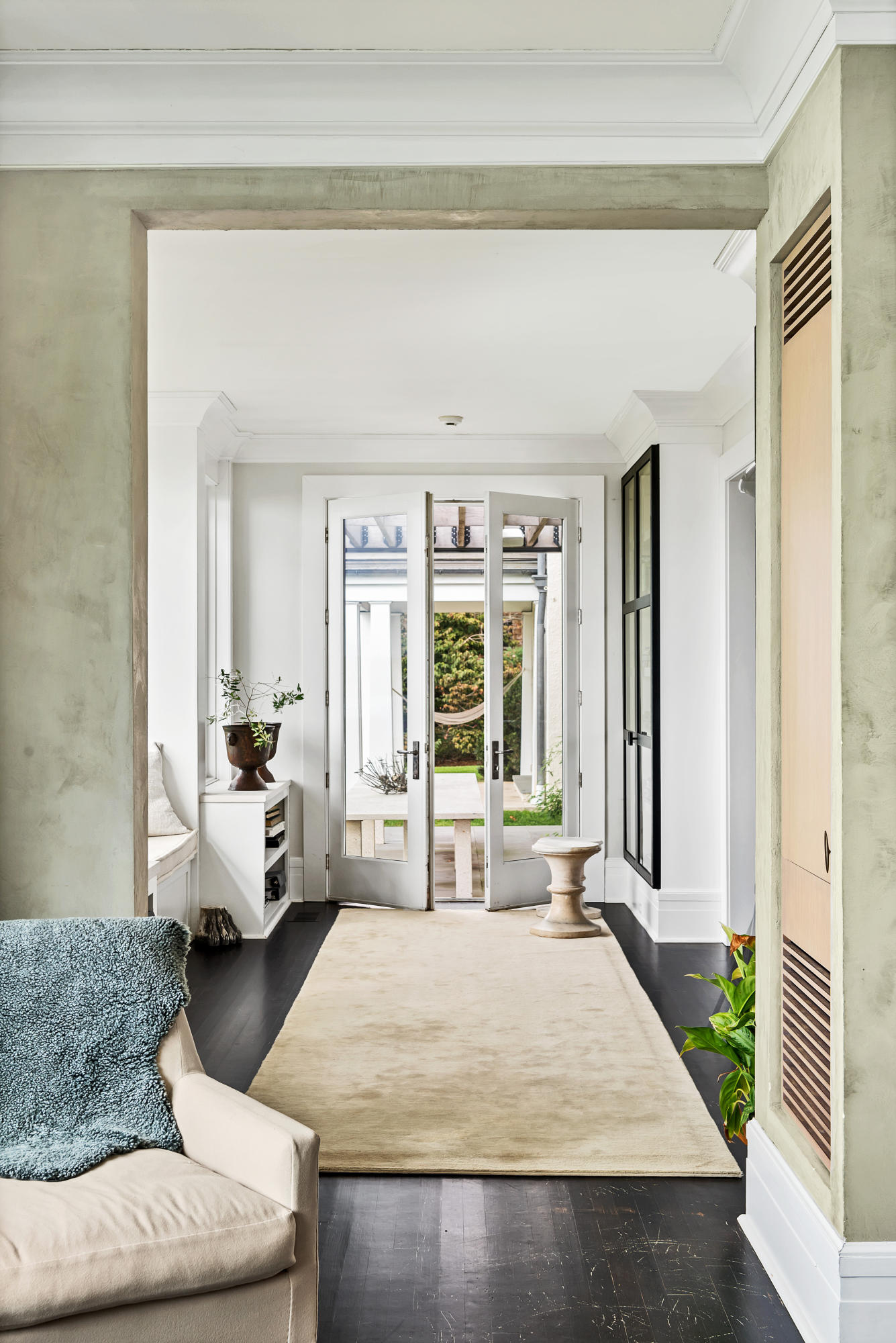 163 Pear Tree Point Road Darien, CT 06820 - Photo 11 of 24 a living room with furniture and a large window