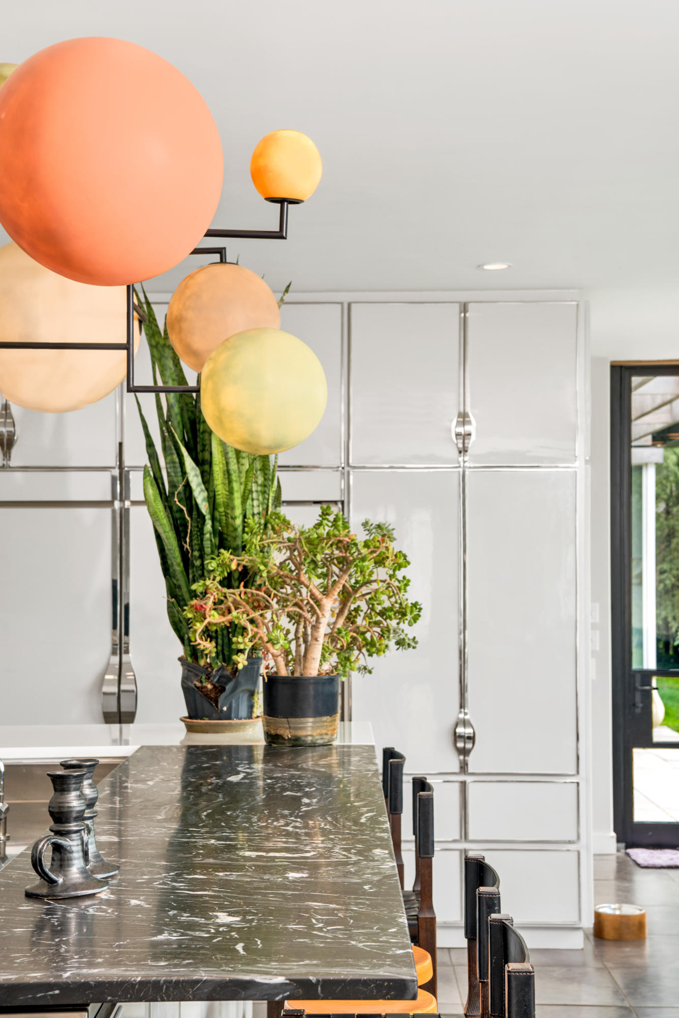 163 Pear Tree Point Road Darien, CT 06820 - Photo 13 of 24 a vase of flowers sitting on a table