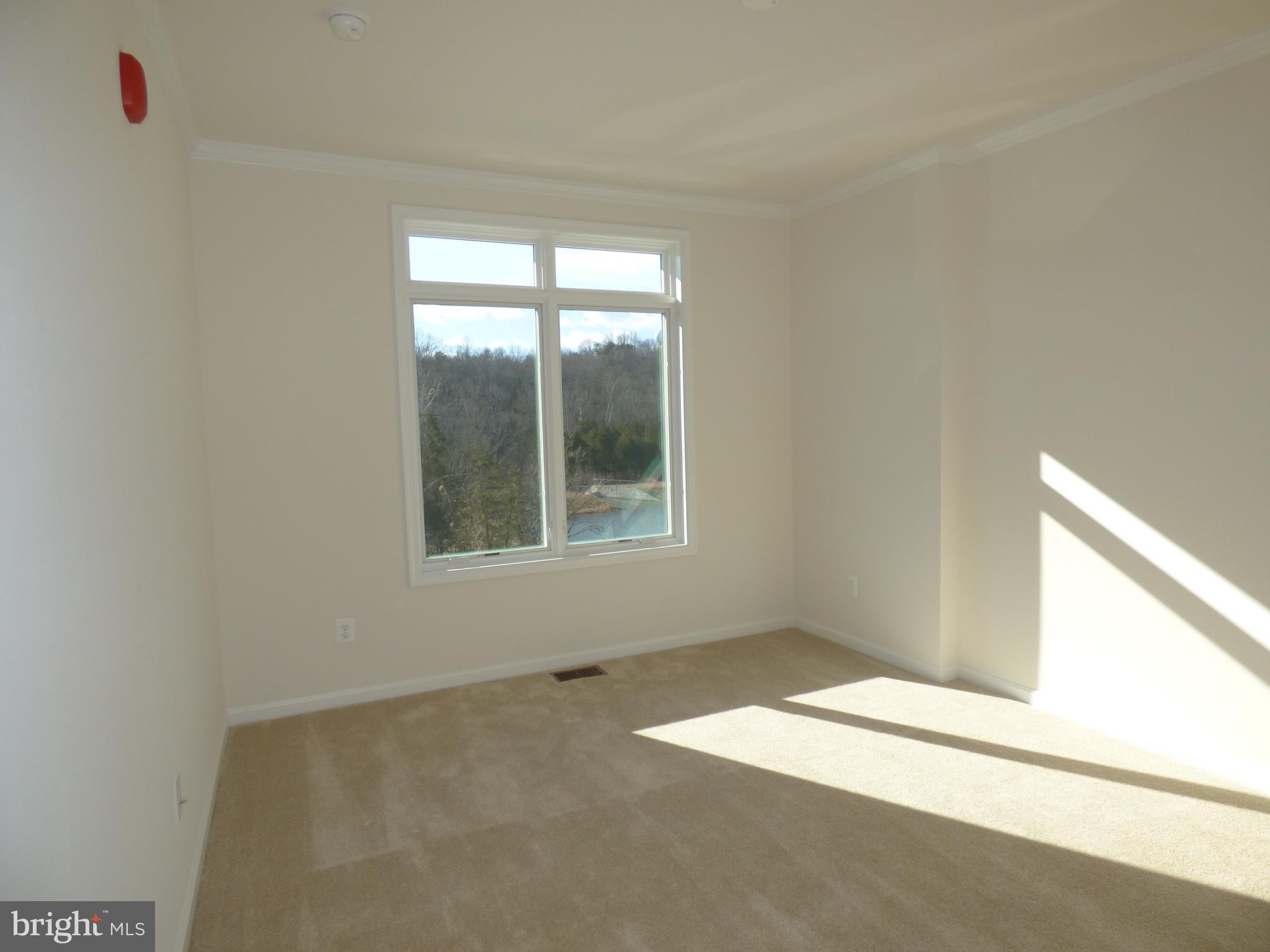 1428 Ribbon Limestone Terrace Southeast, Unit 108 Leesburg, VA 20175 - Photo 24 of 27 Bedroom