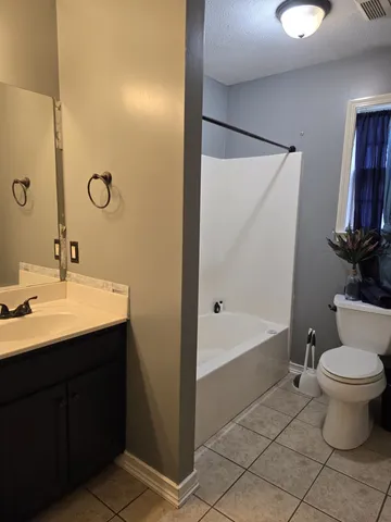 a view of an empty room with window