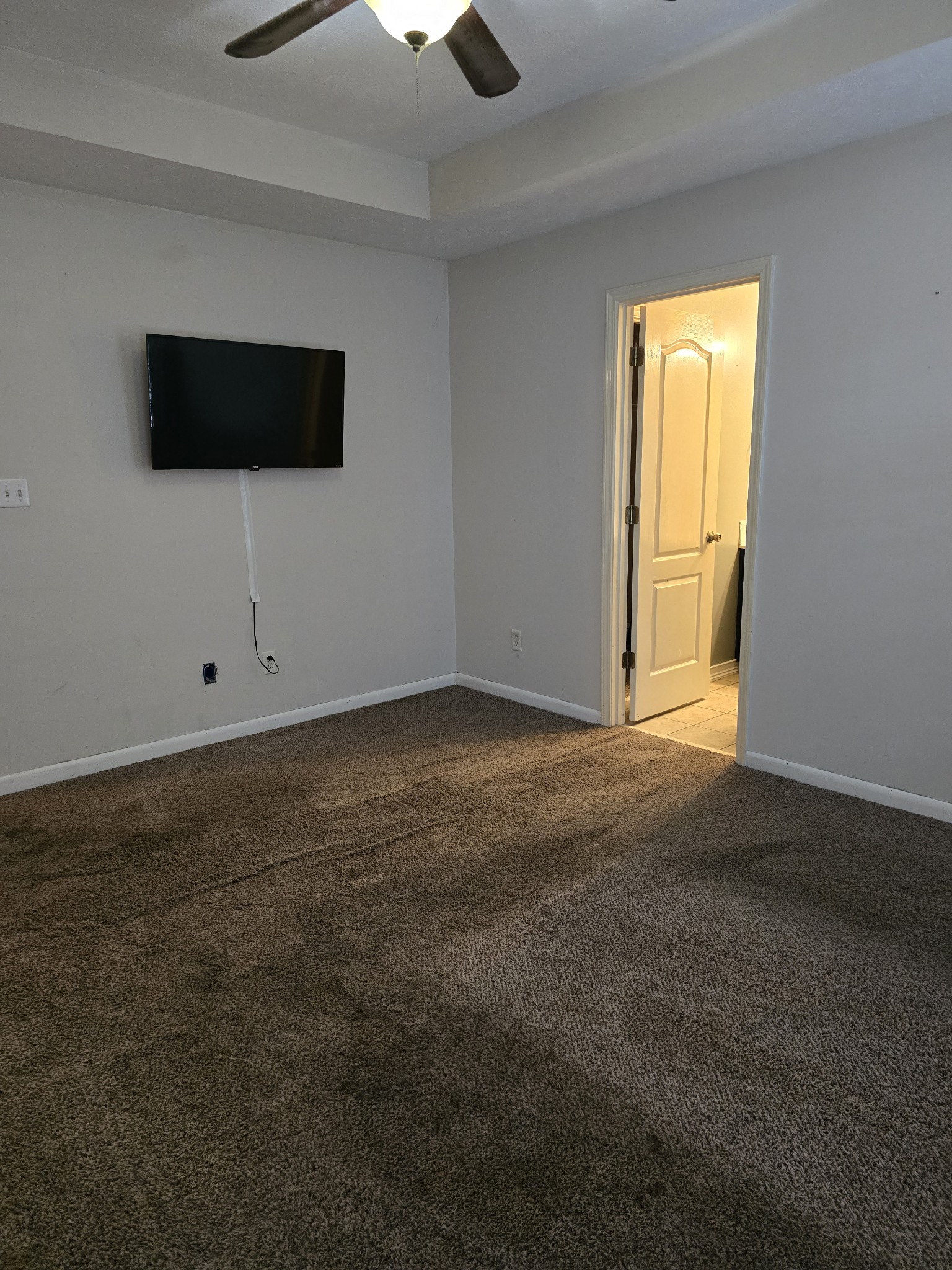 270 Reed Circle Medina, TN 38355 - Photo 18 of 31 a view of an empty room with a window and a kitchen