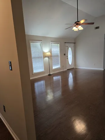 a view of a livingroom with a staircase