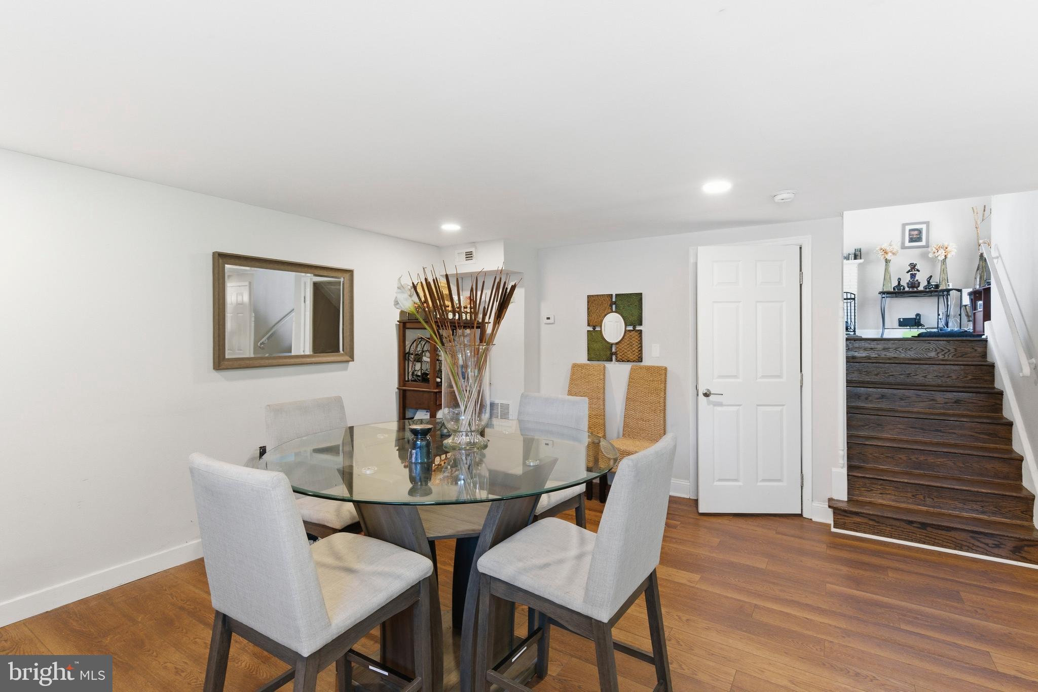 912 Shelley Road Towson, MD 21286 - Photo 9 of 27 a dining room with furniture and wooden floor