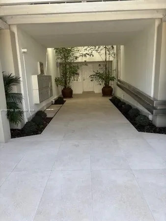 a view of empty room with large window