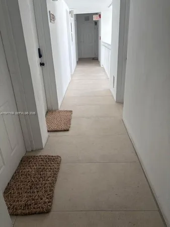 a view of a door and an entryway