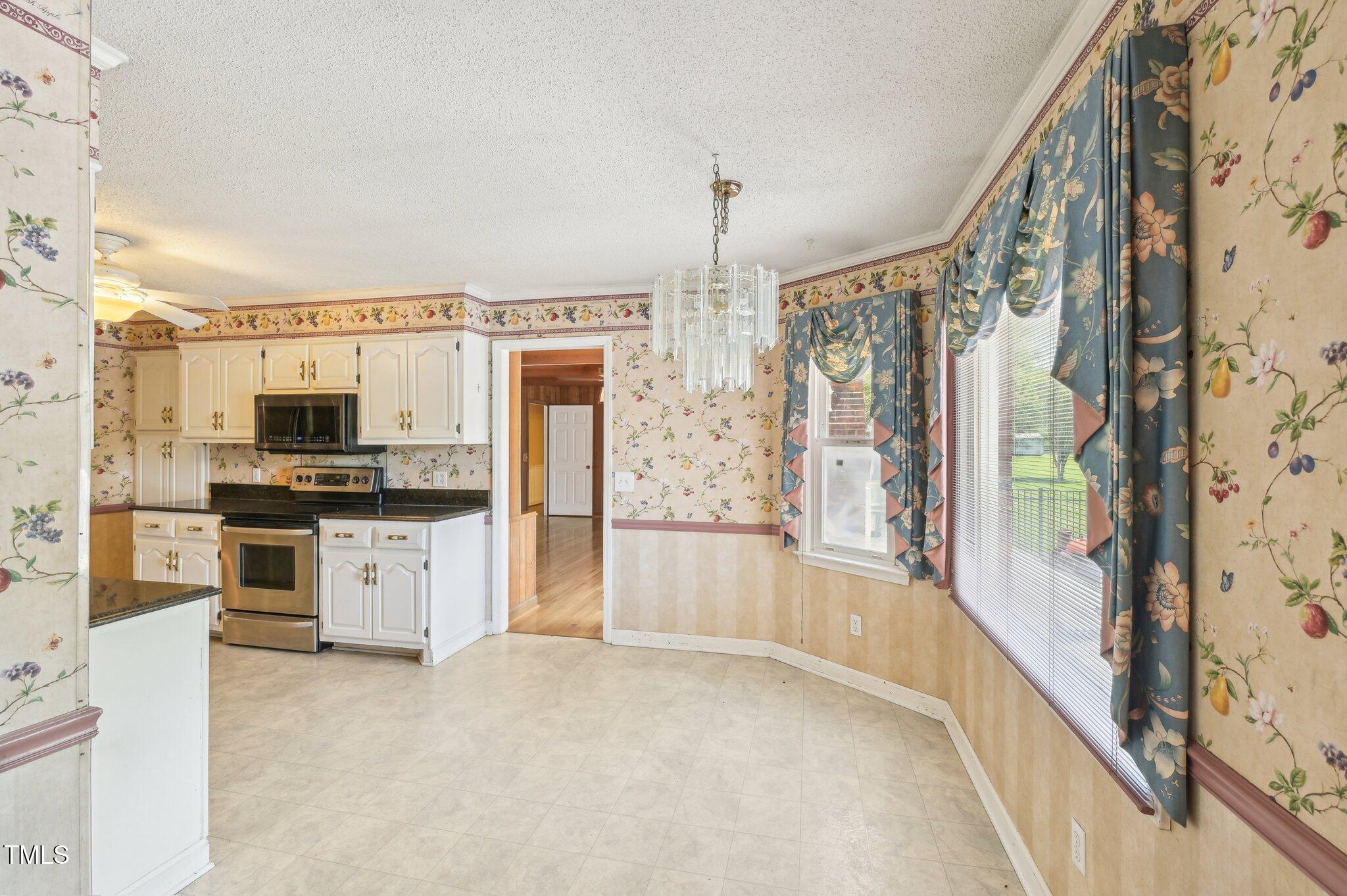 3011 Old Hillsborough Road Mebane, NC 27302 - Photo 11 of 29 a view of living room with furniture and flat screen tv