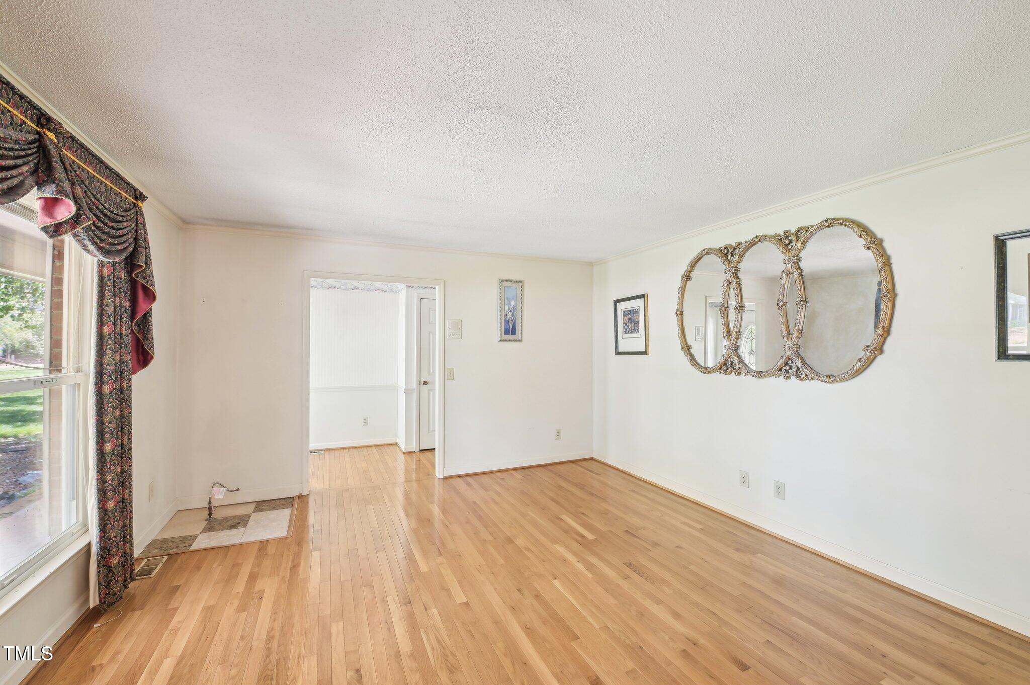3011 Old Hillsborough Road Mebane, NC 27302 - Photo 13 of 29 a view of empty room with wooden floor