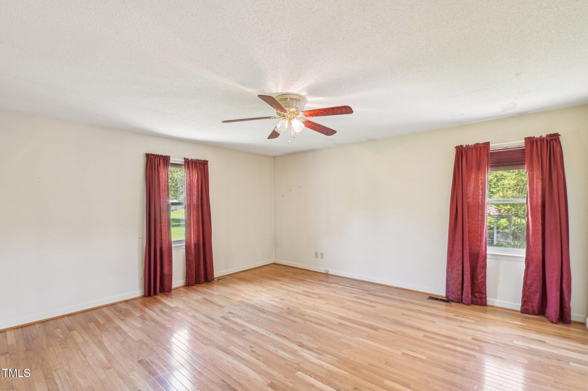 3011 Old Hillsborough Road Mebane, NC 27302 - Photo 16 of 29 a view of a room with window and ceiling fan