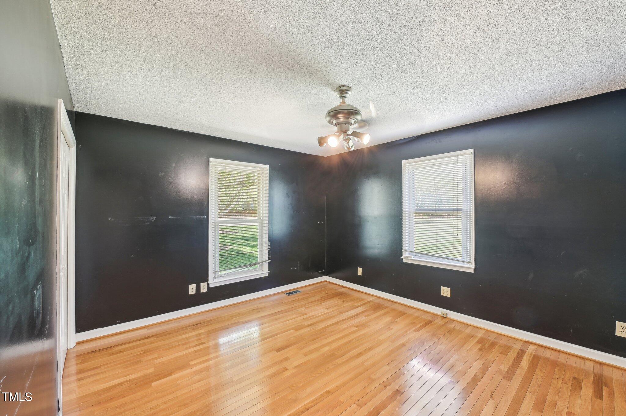 3011 Old Hillsborough Road Mebane, NC 27302 - Photo 20 of 29 an empty room with windows and closet