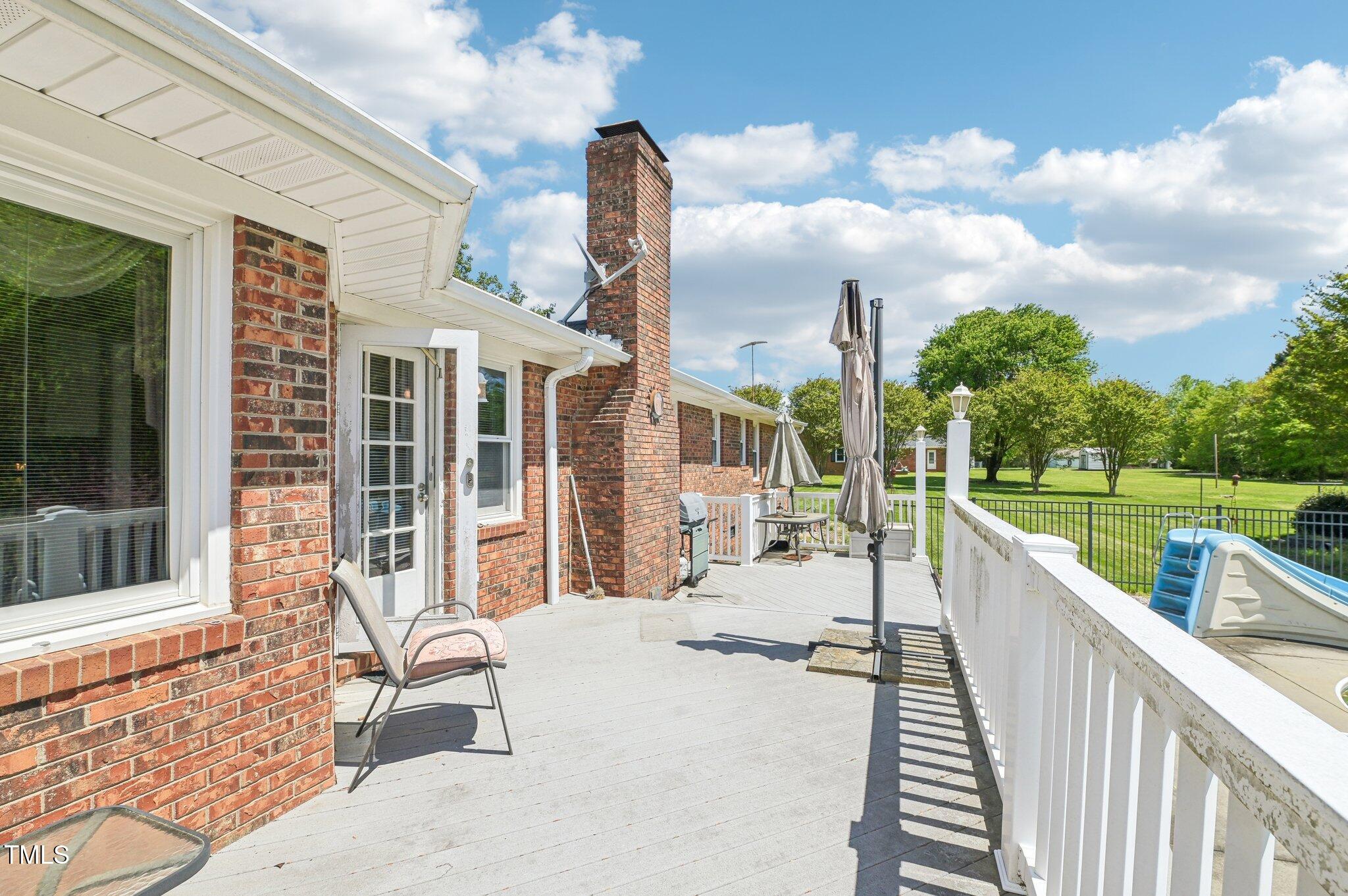 3011 Old Hillsborough Road Mebane, NC 27302 - Photo 24 of 29 a view of a house with a swimming pool and sitting area