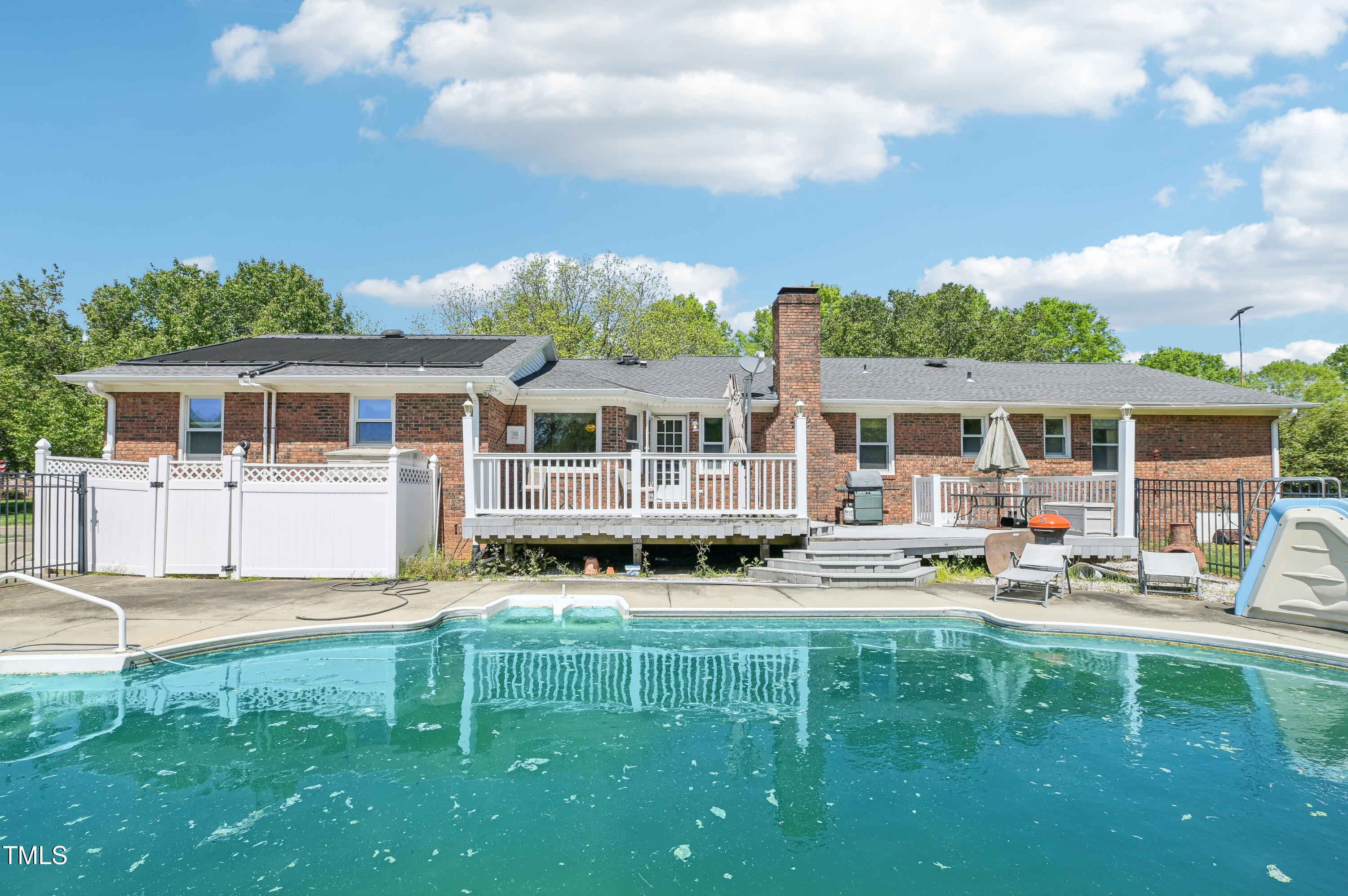 3011 Old Hillsborough Road Mebane, NC 27302 - Photo 25 of 29 a house that has sitting area in front of it