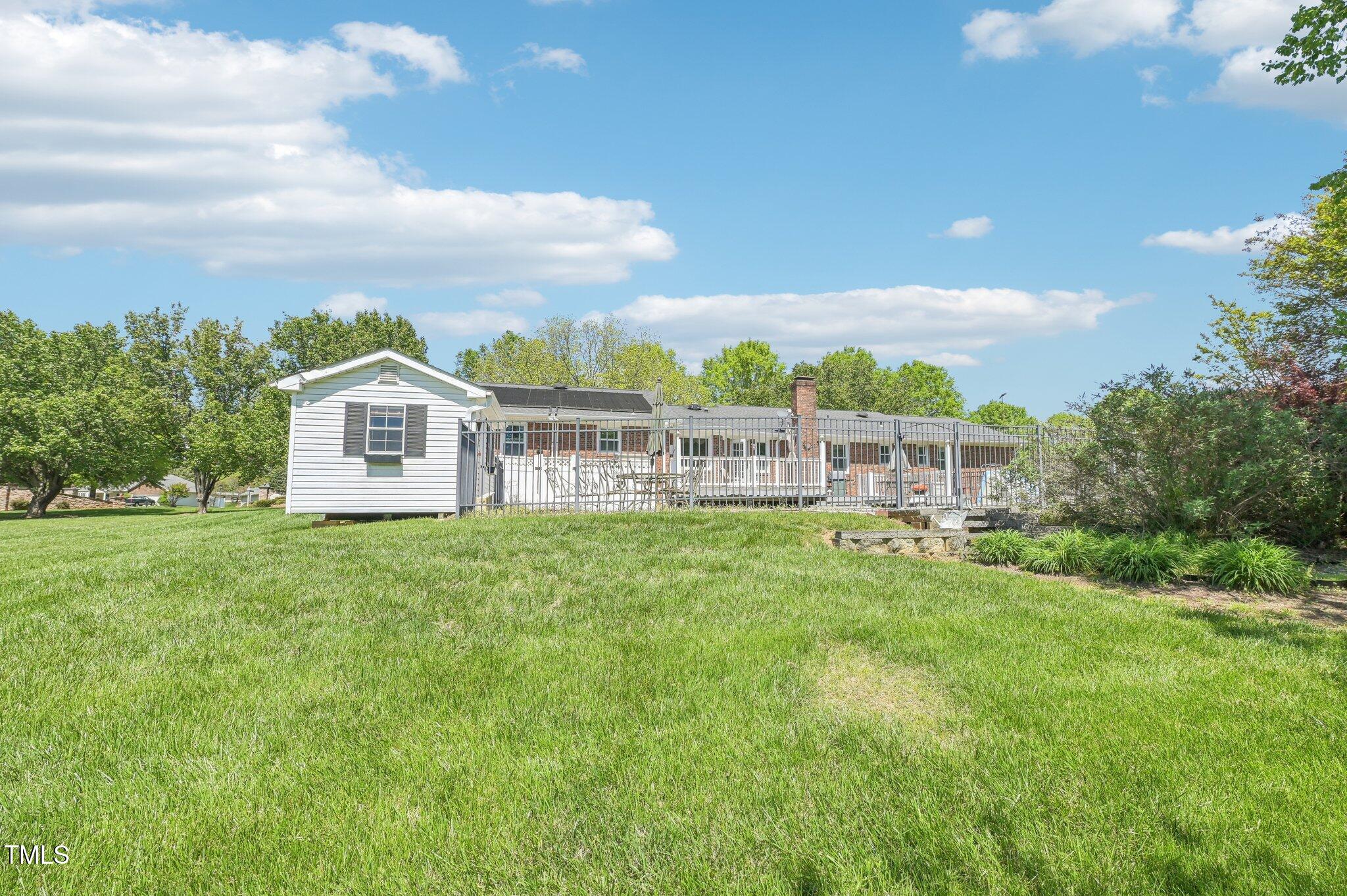 3011 Old Hillsborough Road Mebane, NC 27302 - Photo 28 of 29 a view of a house with a big yard