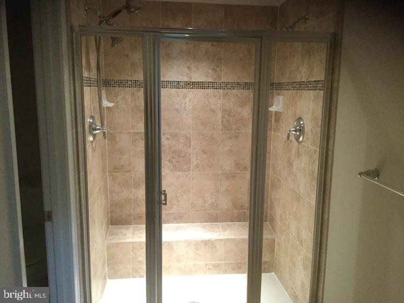2626 St Marys View Road Accokeek, MD 20607 - Photo 21 of 27 Two (2) Headed Shower w/Bench