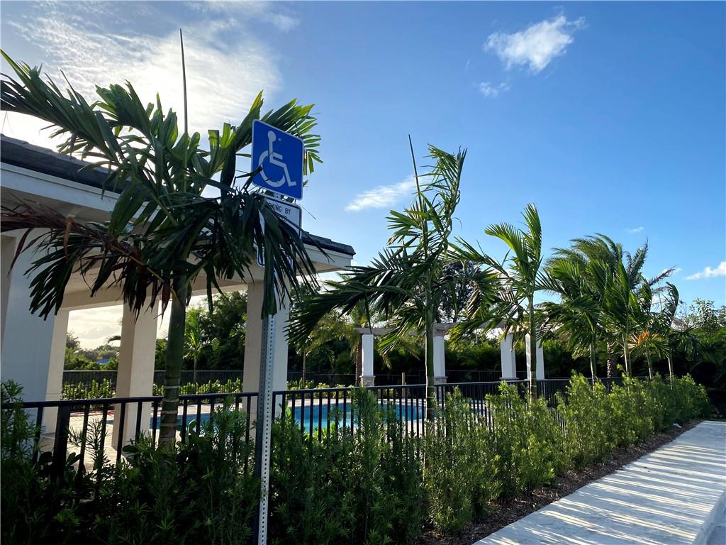 445 Northwest 33rd Lane Pompano Beach, FL 33069 - Photo 18 of 19 a view of a backyard of a house with a fountain