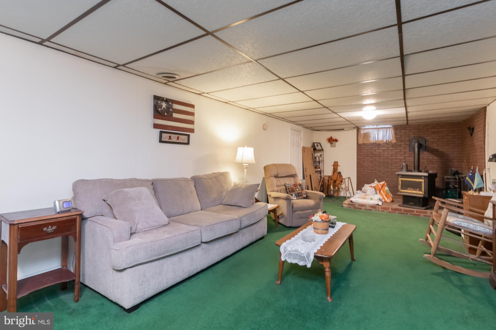 1492 Thies Drive Pasadena, MD 21122 - Photo 27 of 37 Pellet stove for extra warmth!