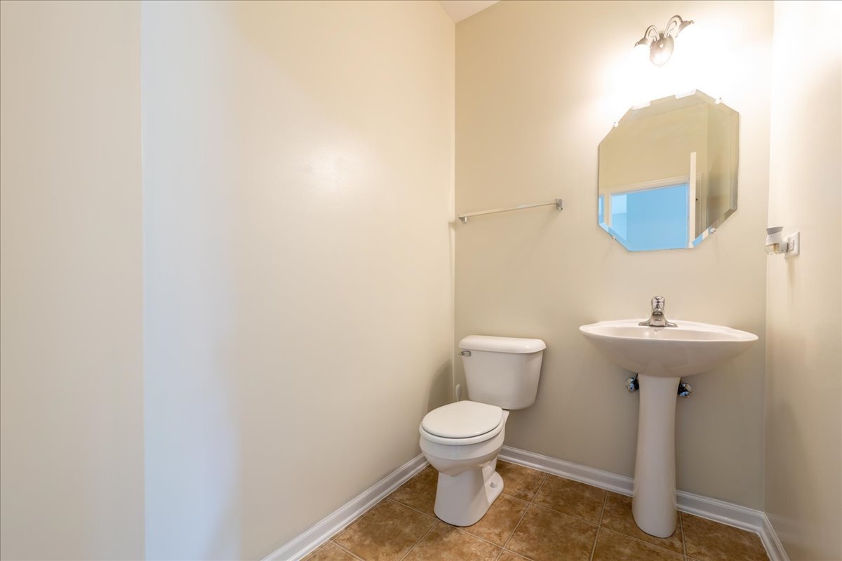 233 Jackson Street Gilberts, IL 60136 - Photo 13 of 29 a bathroom with a sink toilet and mirror