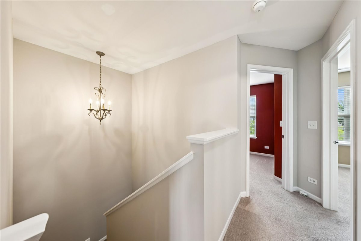 233 Jackson Street Gilberts, IL 60136 - Photo 14 of 29 a view of a hallway view with staircase
