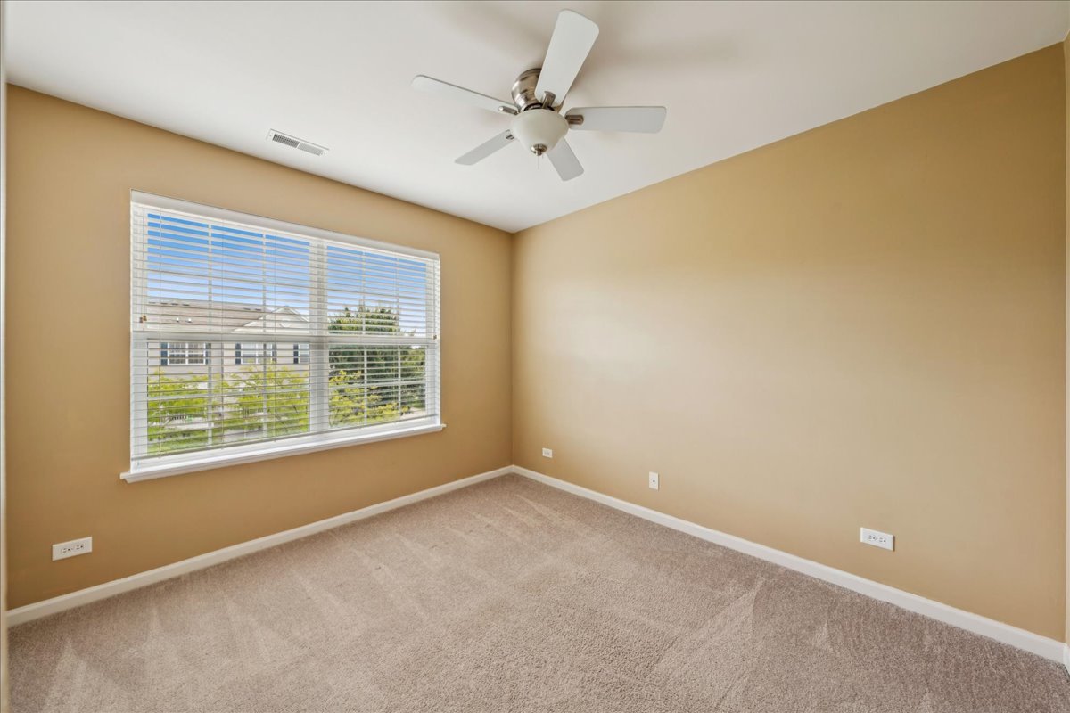 233 Jackson Street Gilberts, IL 60136 - Photo 16 of 29 a view of an empty room with a window