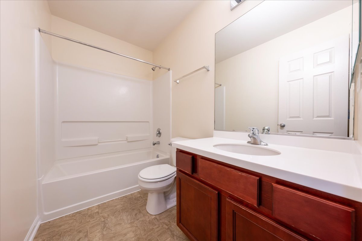 233 Jackson Street Gilberts, IL 60136 - Photo 17 of 29 a bathroom with a sink a toilet and shower